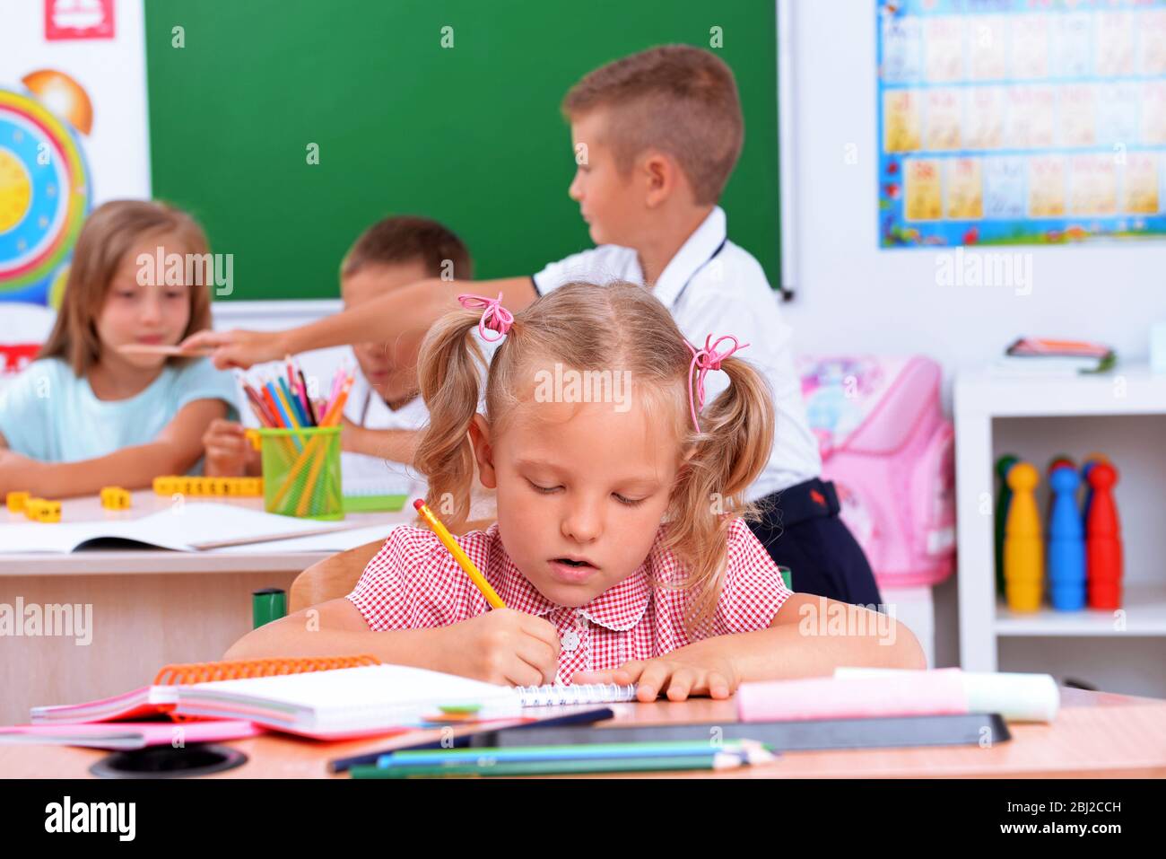 Children drawing desks in hi-res stock photography and images - Alamy