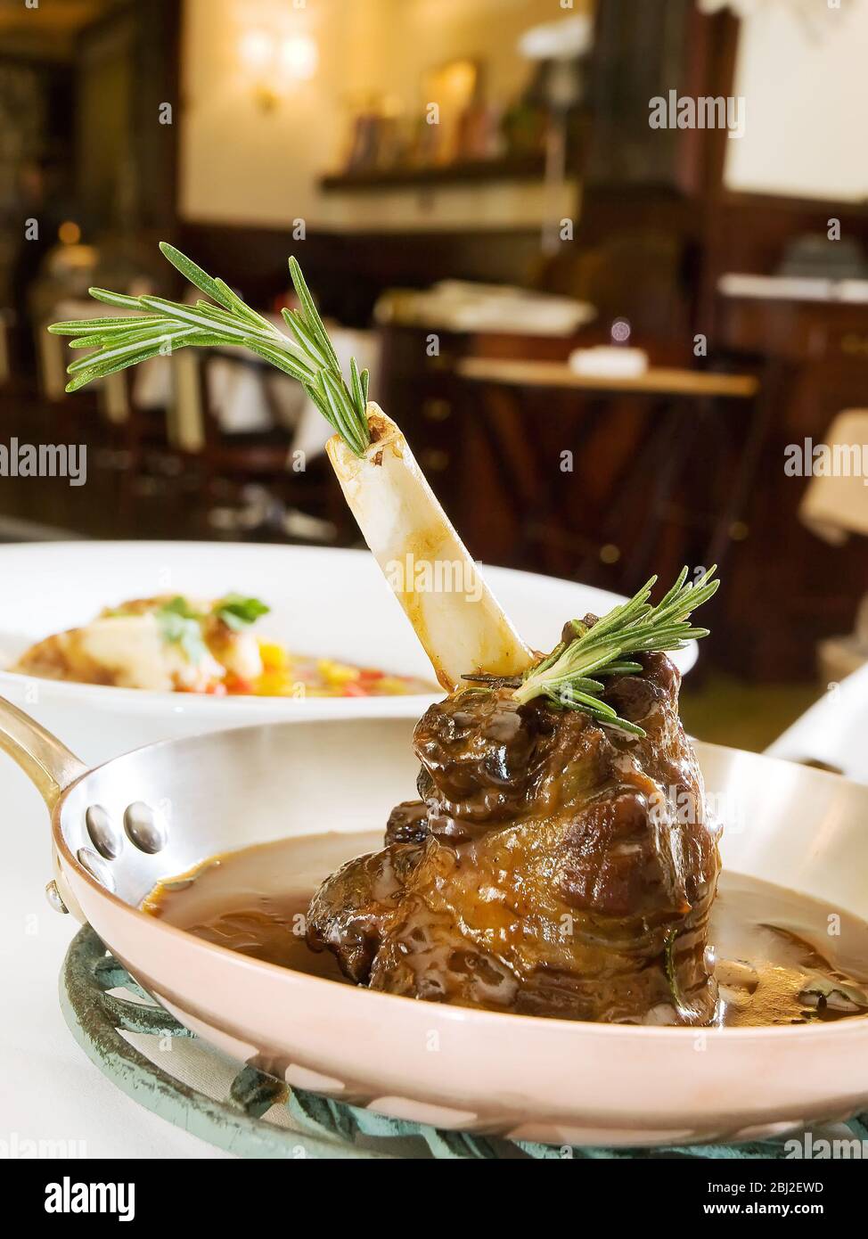 Slow Cooked Lamb shank braised in an onion jus and Red Wine Sauce Stock