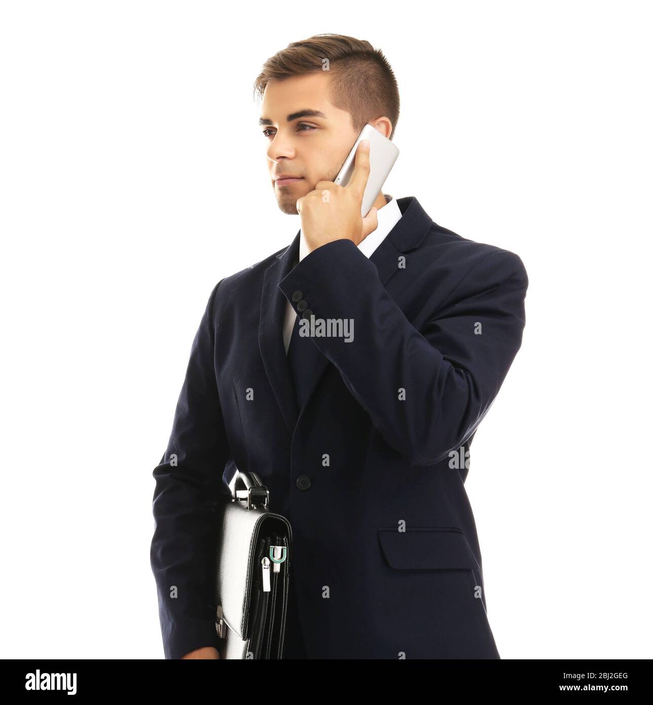 Elegant man in suit with briefcase isolated on white Stock Photo - Alamy