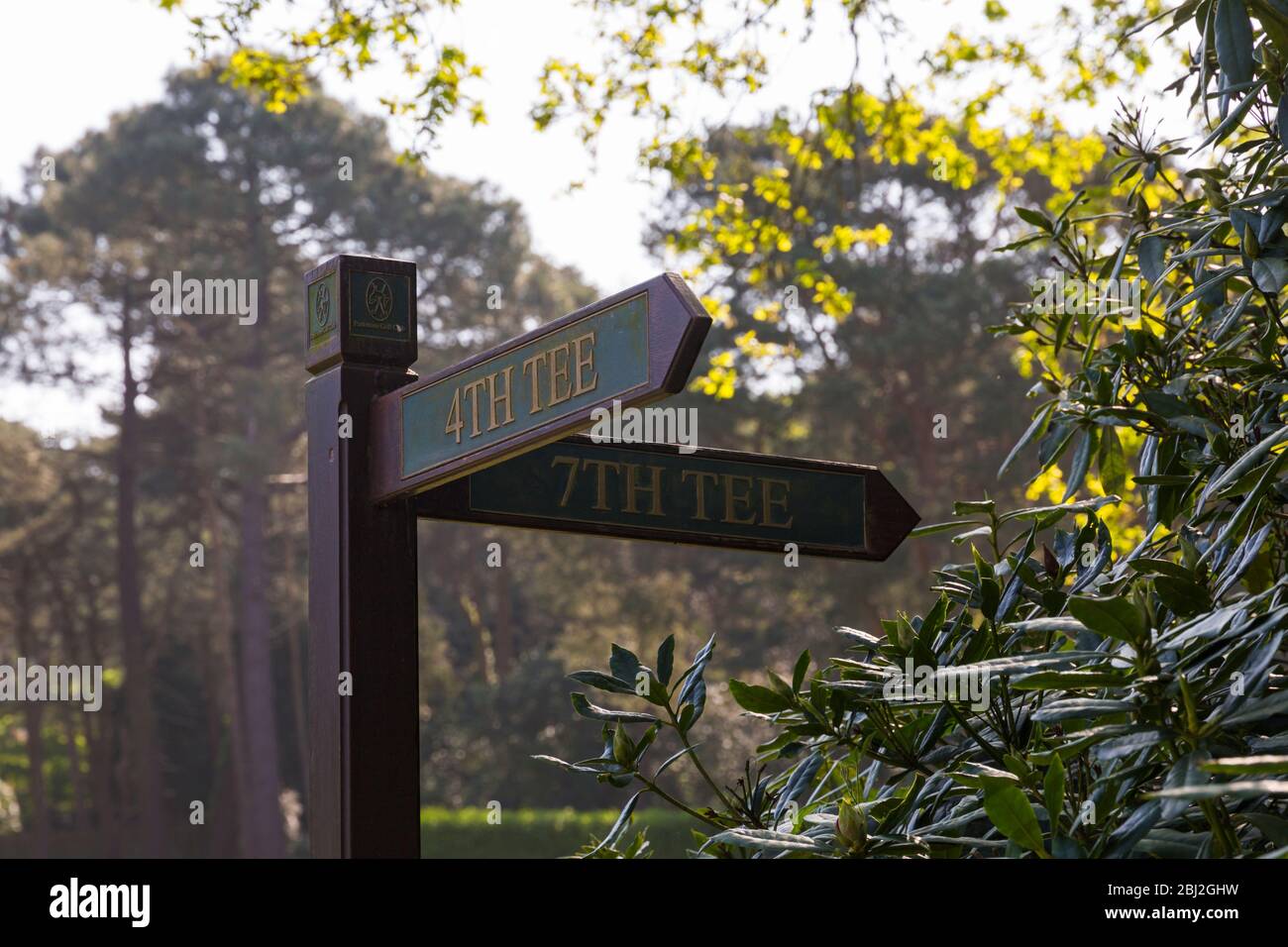 signs for the 4th tee and 7th tee at golf course at Dorset, UK in April