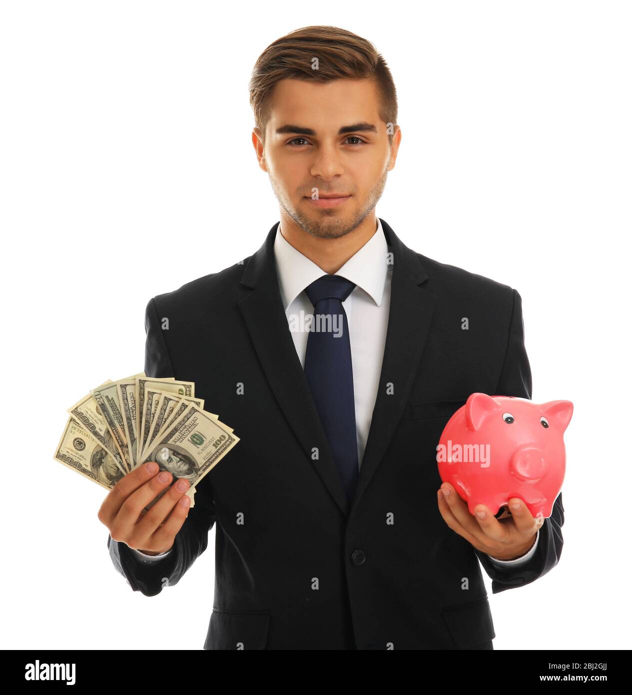 Elegant man holding piggy bank with money isolated on white Stock Photo ...