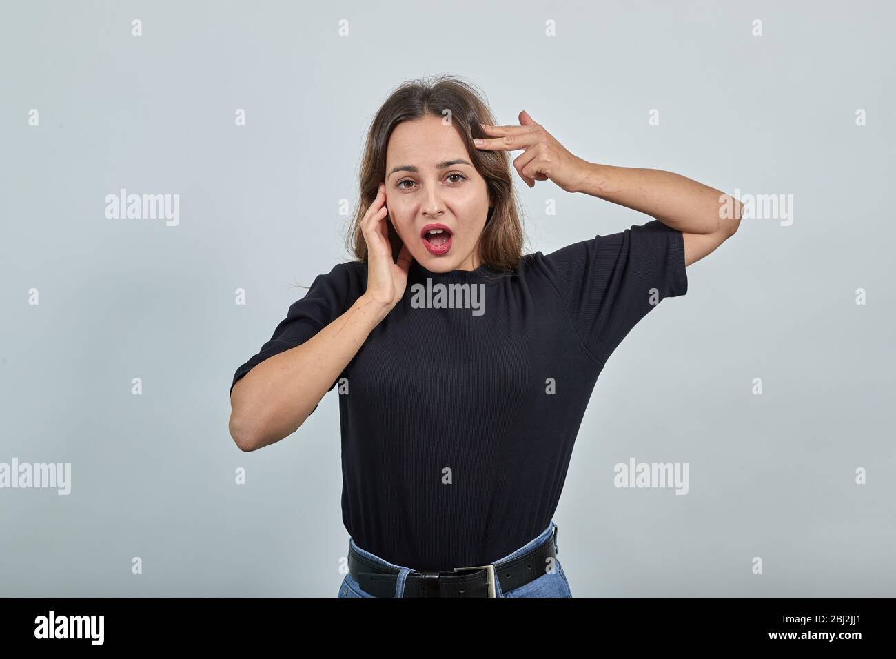 Uncertain woman surprised young hi-res stock photography and images - Alamy