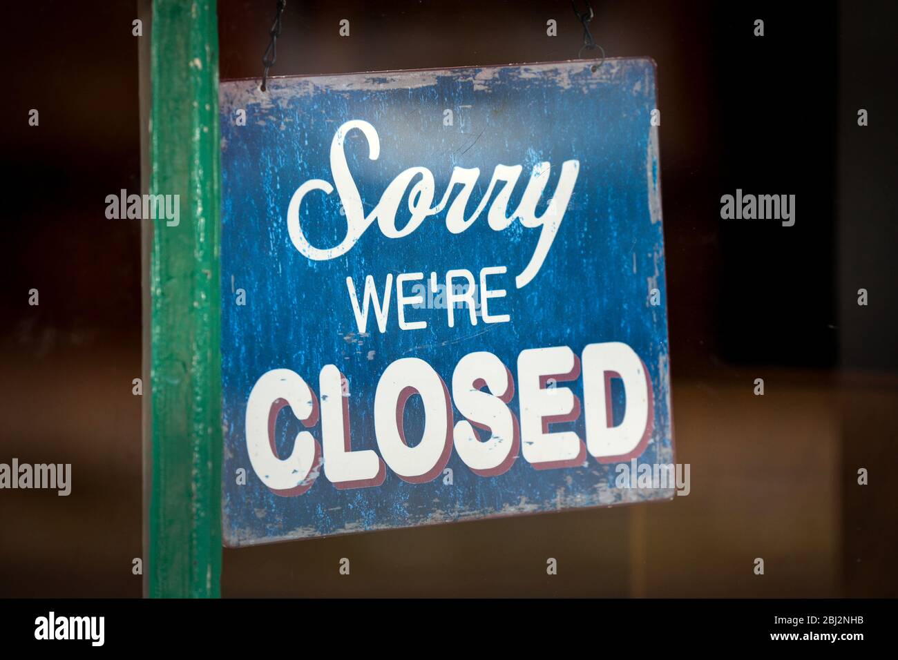Closed sign in a shop window Stock Photo