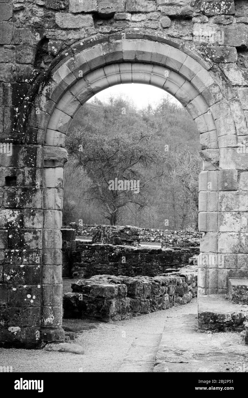 Arch doorway from the infirmery at Rievaulx Abbey North Yorkshire Stock Photo