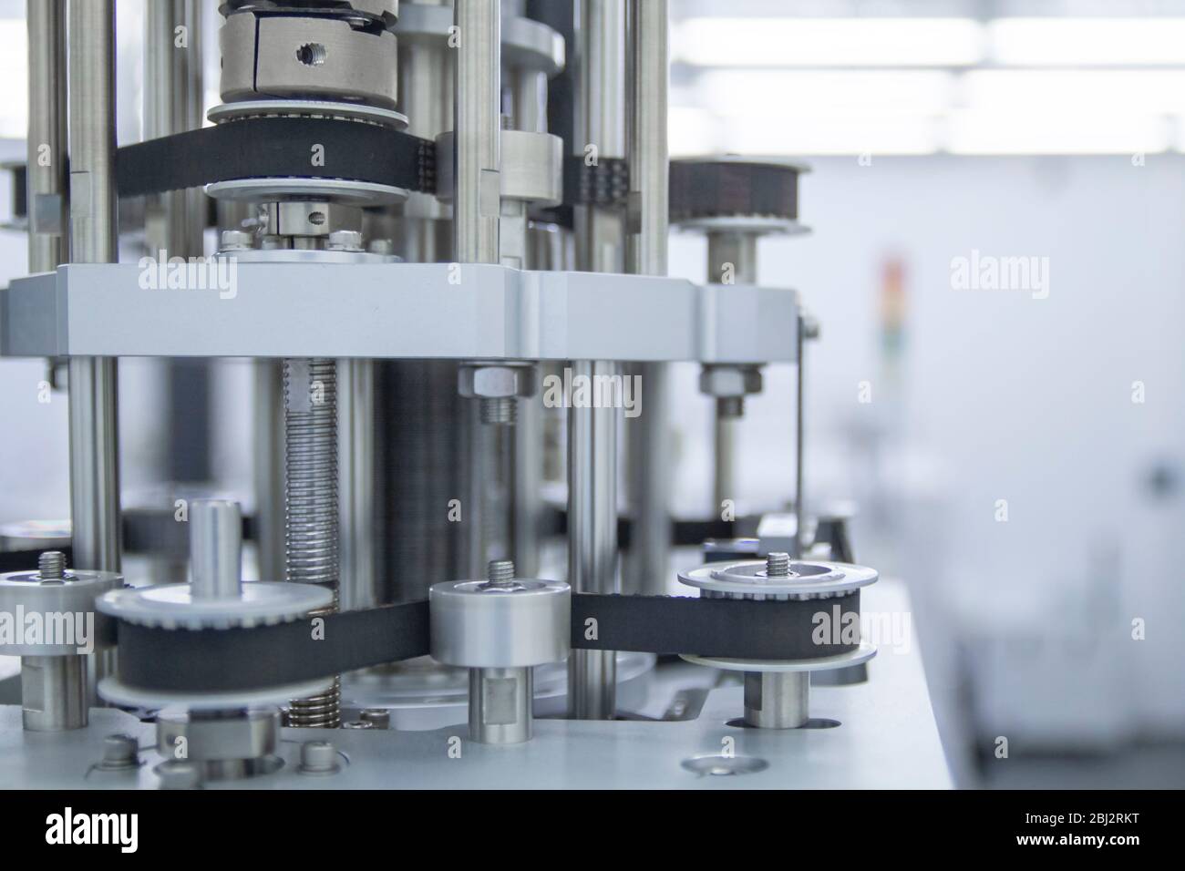 Block of servo motors belts on an electronic equipment factory. Stock Photo