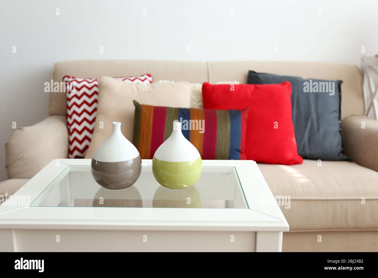beige sofa with pillows