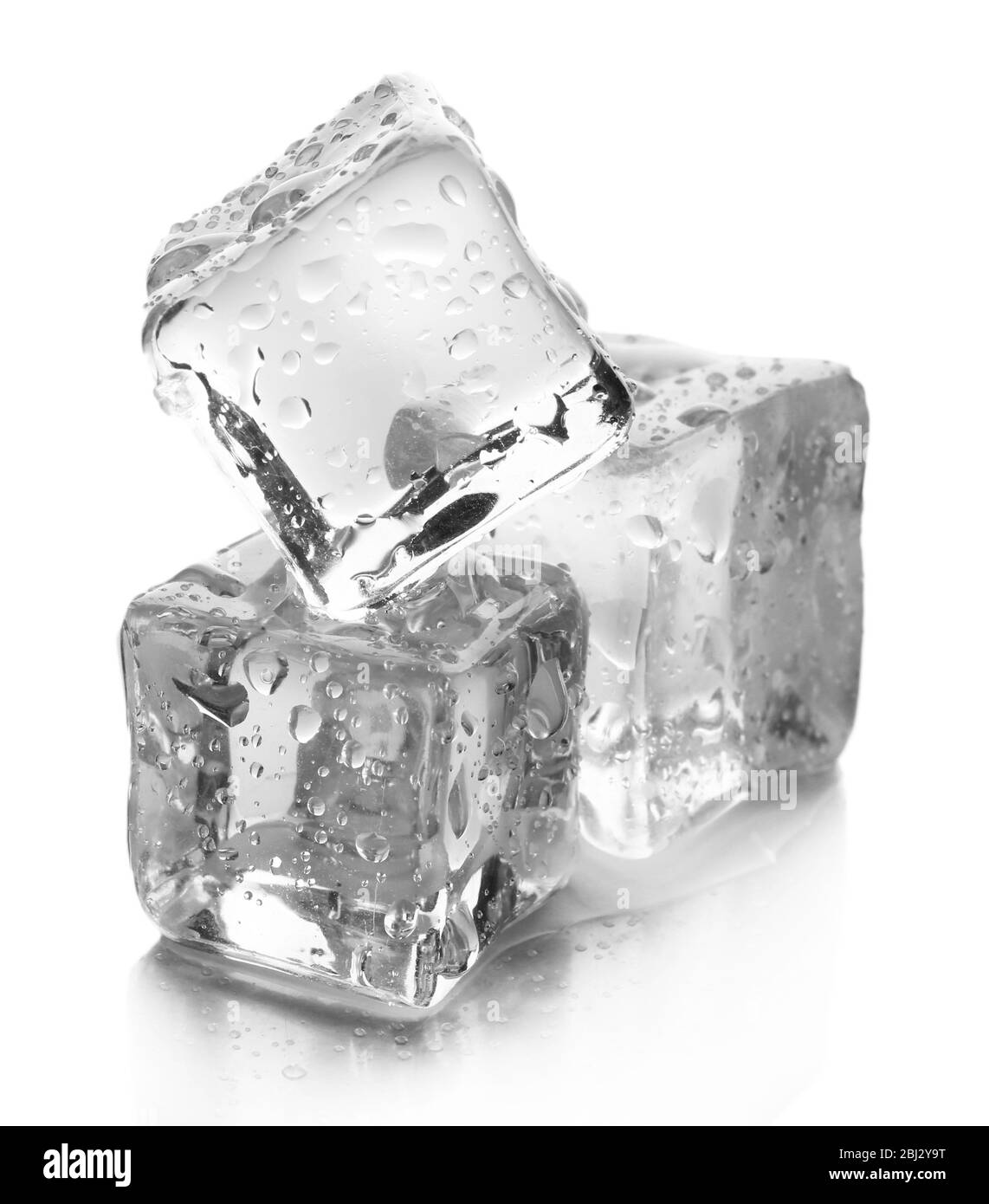 Three melting ice cubes on grey background, close up Stock Photo