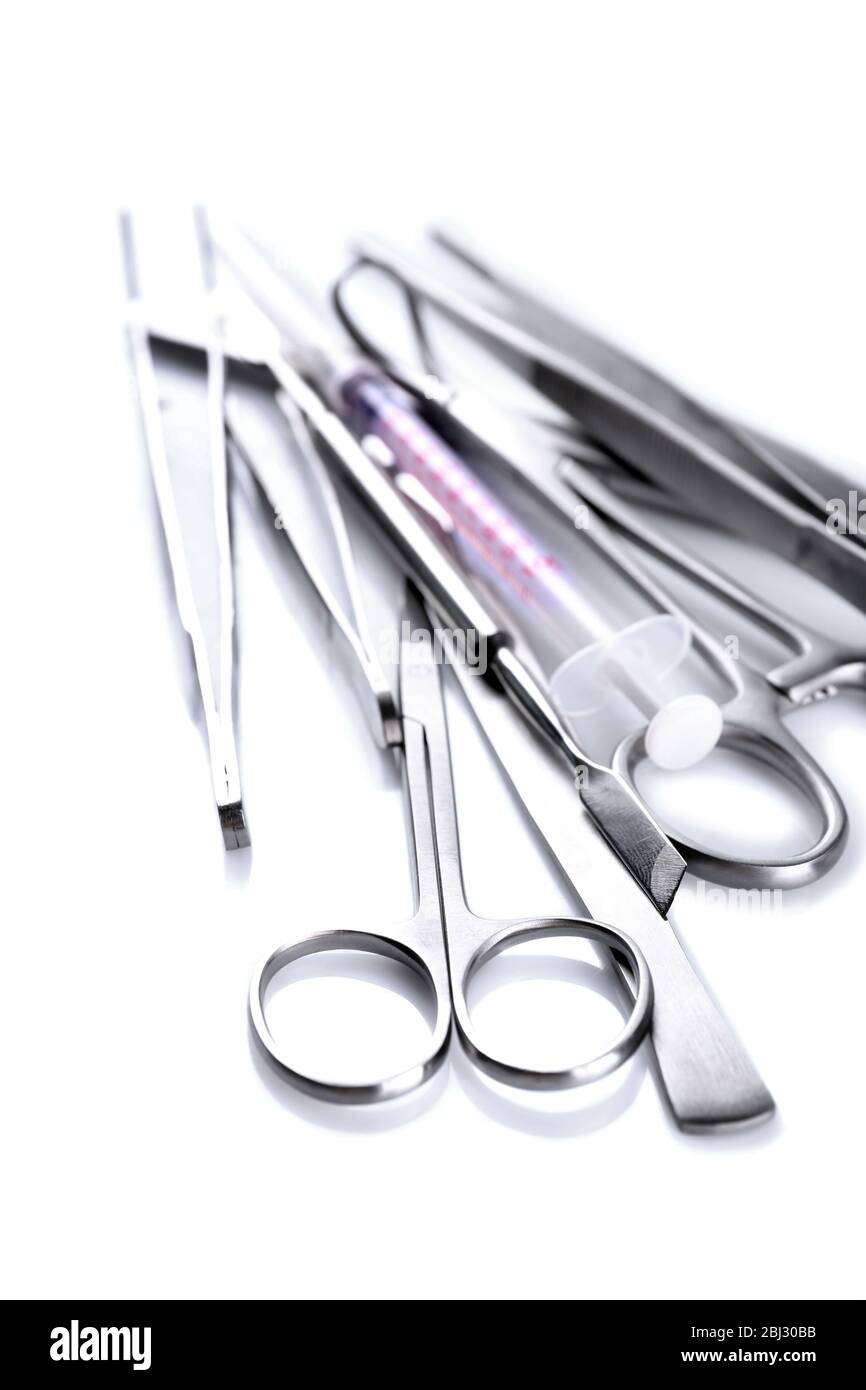 Surgery instruments isolated on white Stock Photo - Alamy