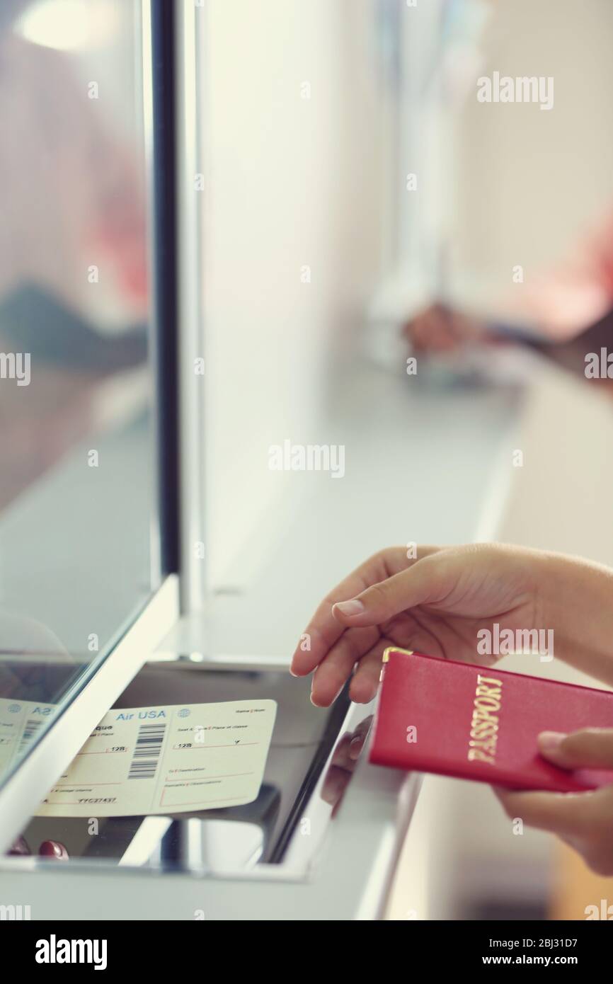 Airport Check-In Counters With Passengers Stock Photo - Alamy