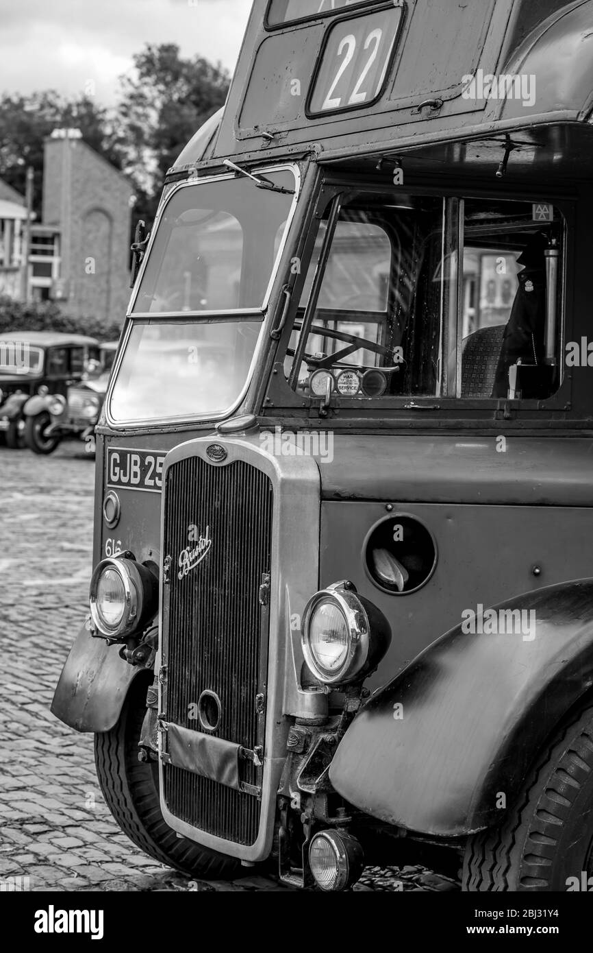 Monochrome front close up of vintage, halfcab Thames Valley Bristol bus, parked at Severn Valley Railway station, 1940s WWII wartime summer event. Stock Photo