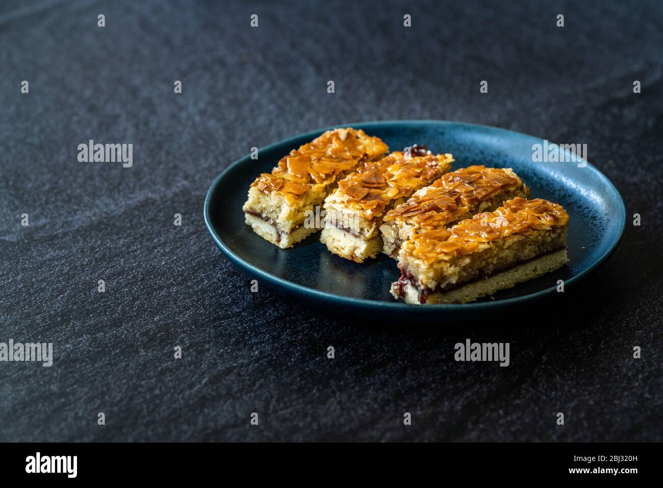 Scandinavian Dessert Swedish Tosca Cake Slices / Toscakaka. Traditional Food. Stock Photo