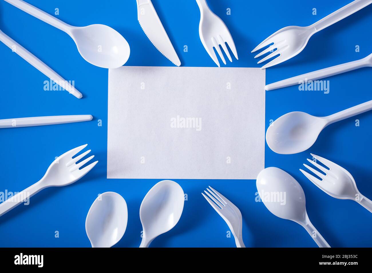 single use plastic forks, spoons. concept of recycling plastic, plastic