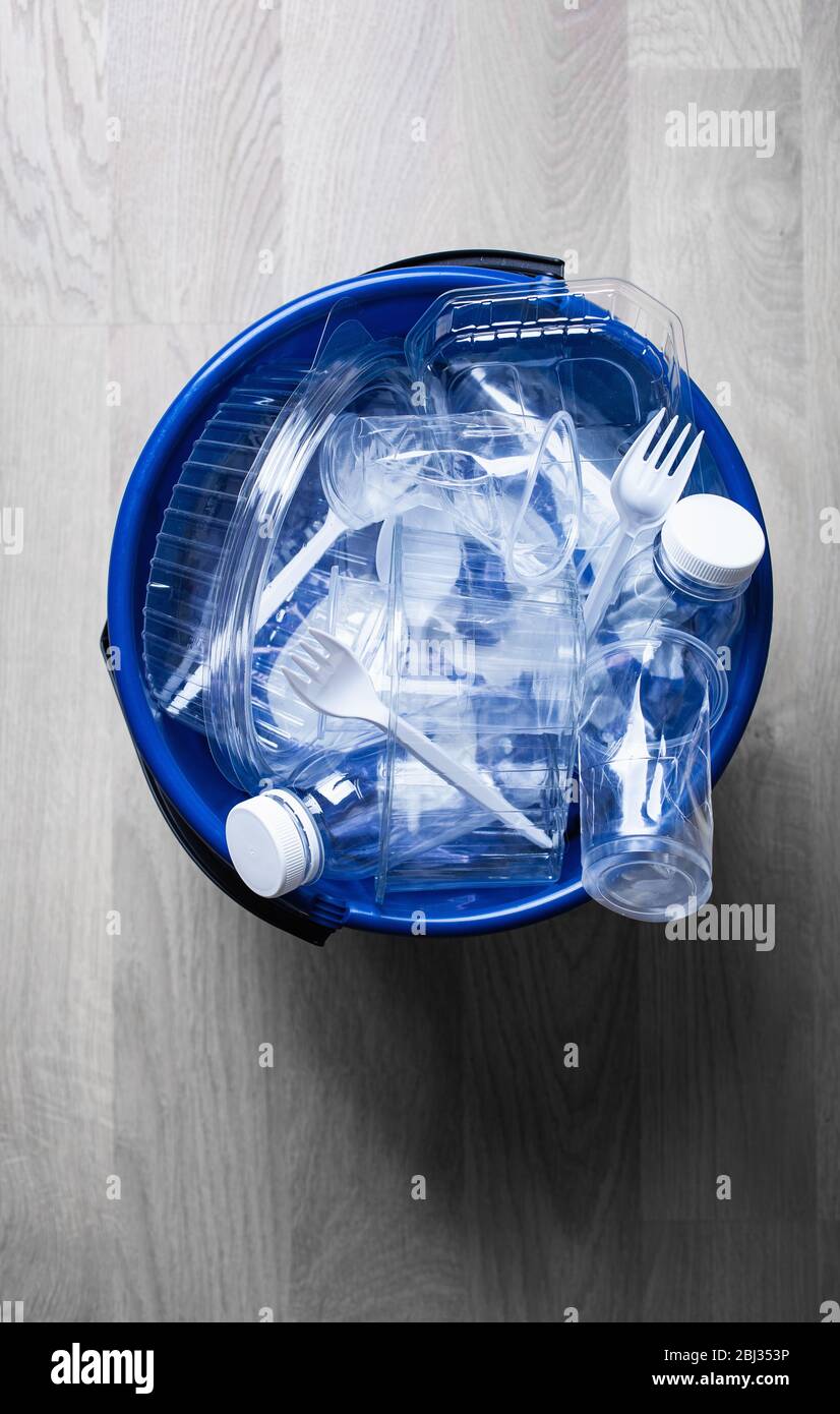 clean recyclable plastic bottles, containers, cups in garbage bin. waste management plastic reuse Stock Photo