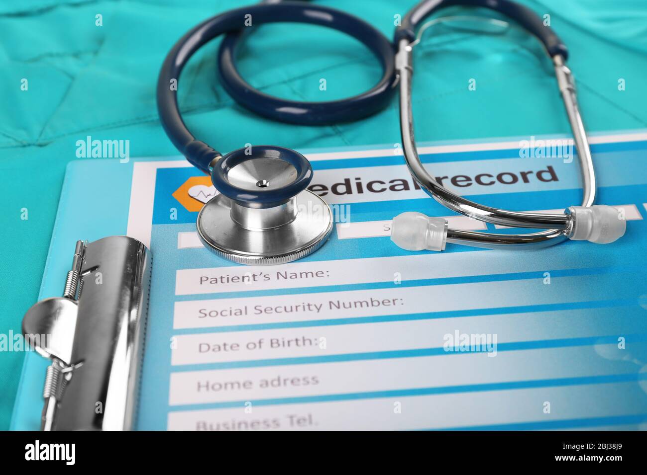 Medical stethoscope and clipboard on blue background Stock Photo - Alamy