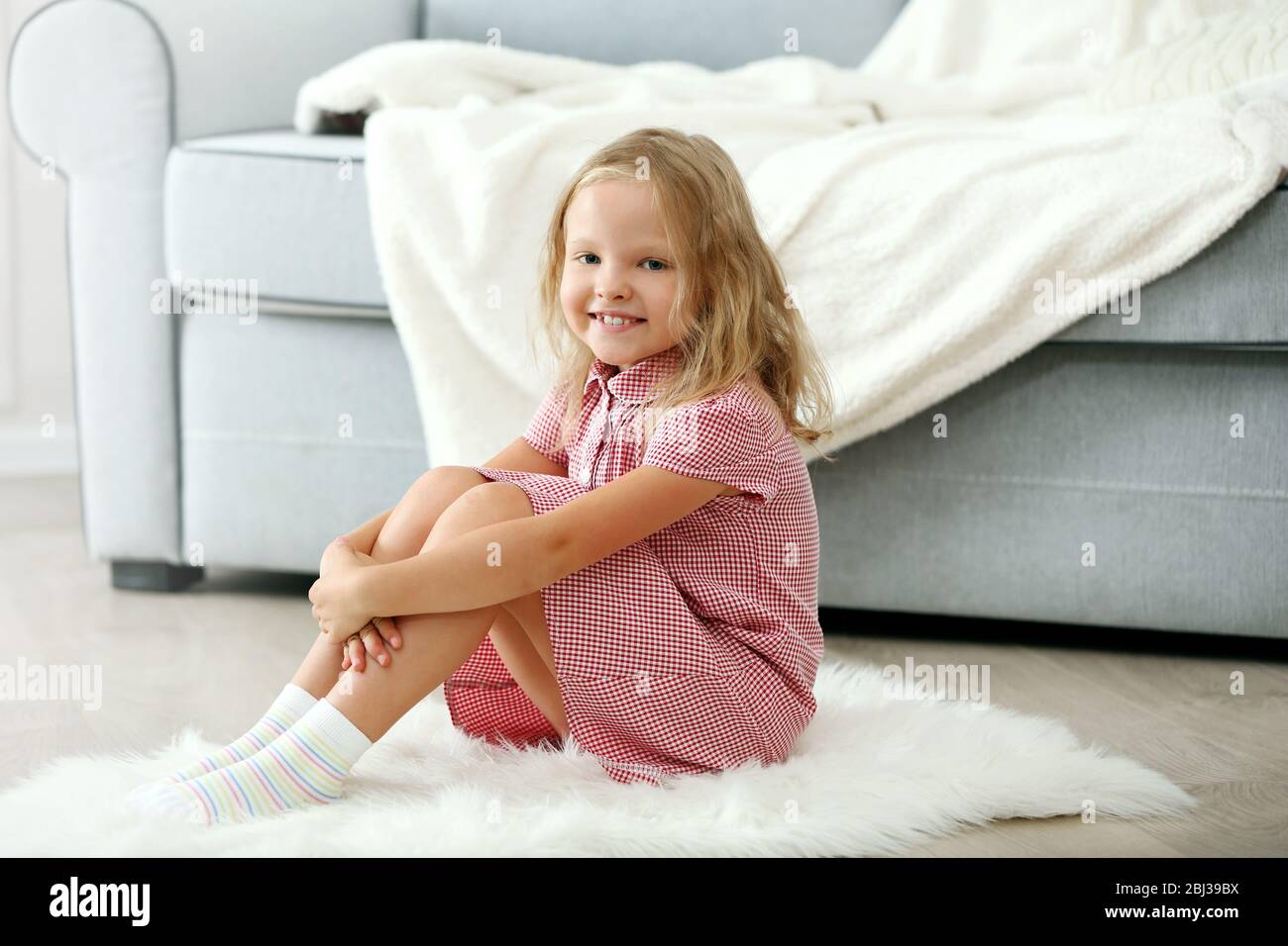 Little girl in the room Stock Photo - Alamy
