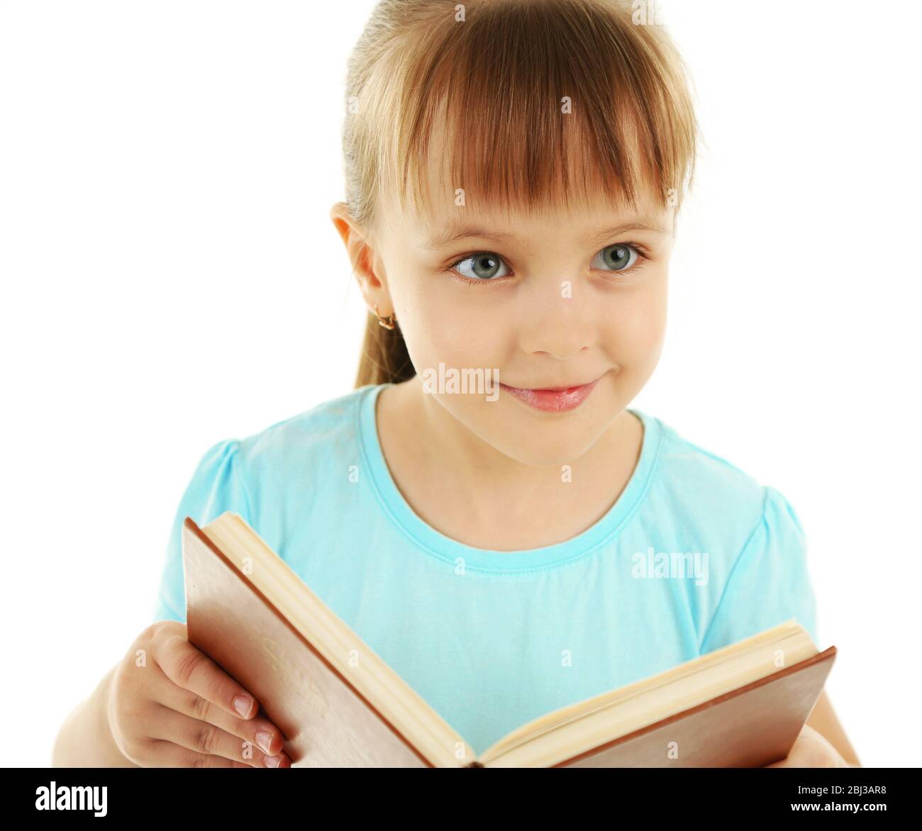 Beautiful little girl with book, isolated on white Stock Photo - Alamy