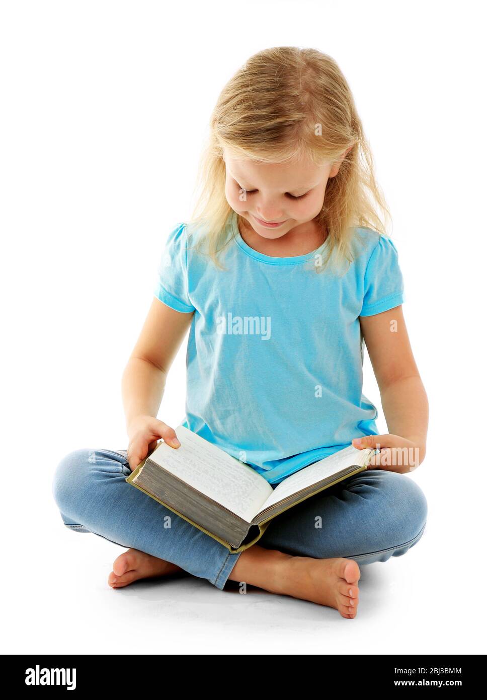 Beautiful little girl with book, isolated on white Stock Photo - Alamy