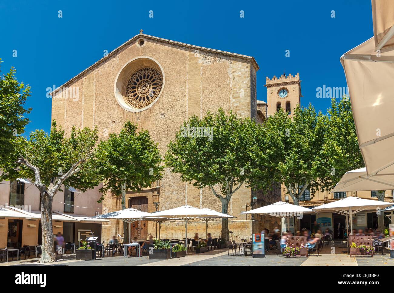The market square Placa Major and the church Santa Maria dels Àngels ...