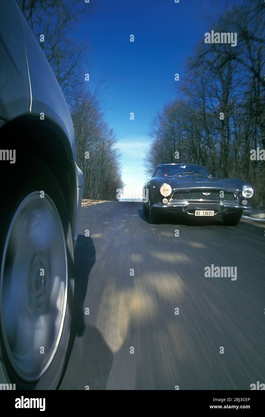 Driving in France in a 1960 Aston Martin DB4 Bertone Jet. Stock Photo