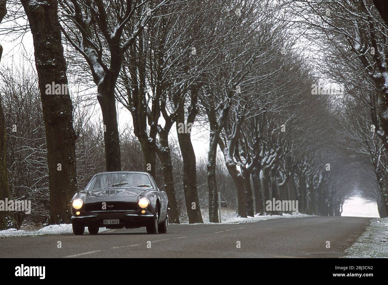 Driving in France in a 1960 Aston Martin DB4 Bertone Jet. Stock Photo