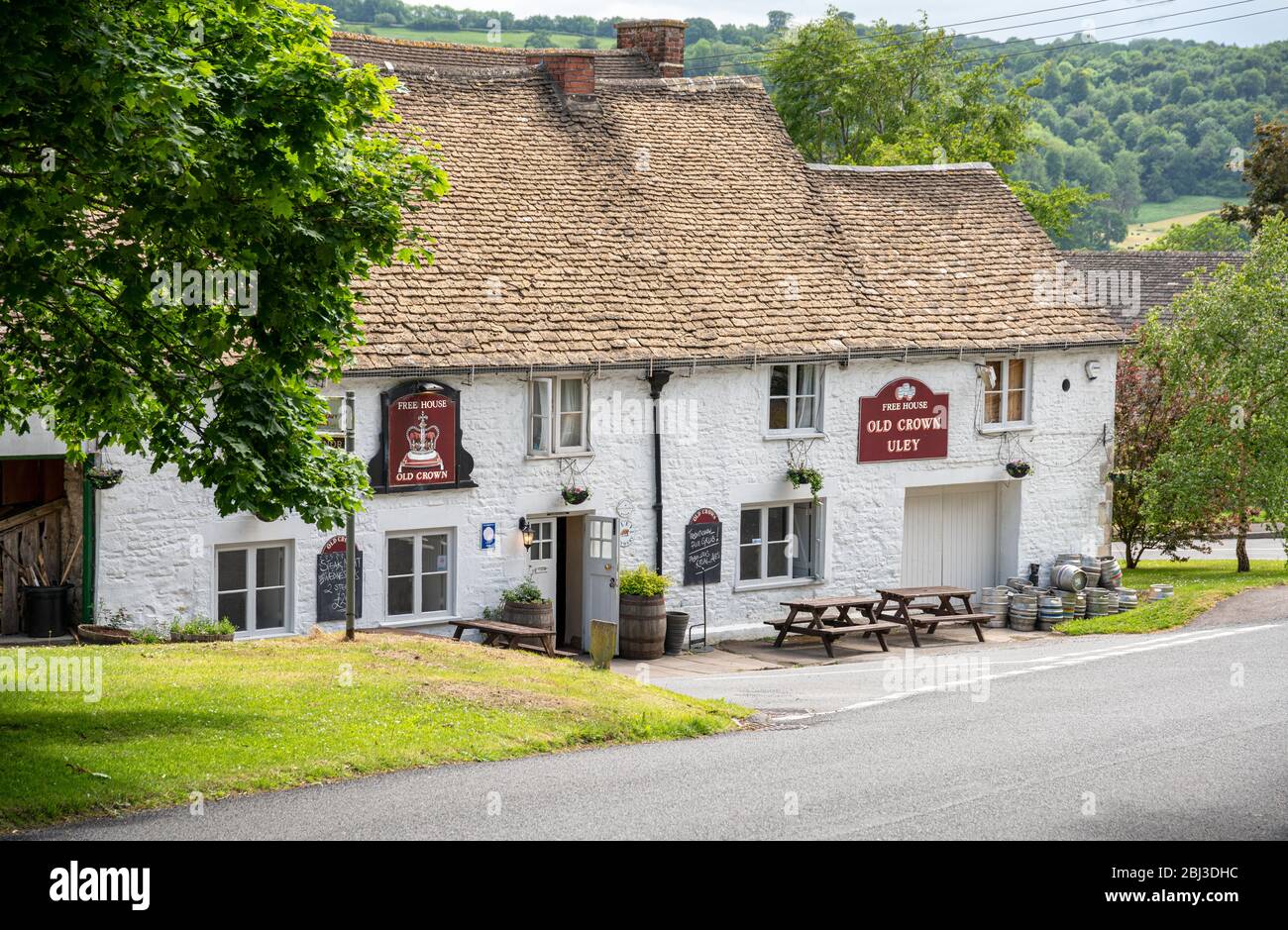 The Cotswold village of Uley with the Old Crown country pub, Gloucestershire, United Kingdom Stock Photo