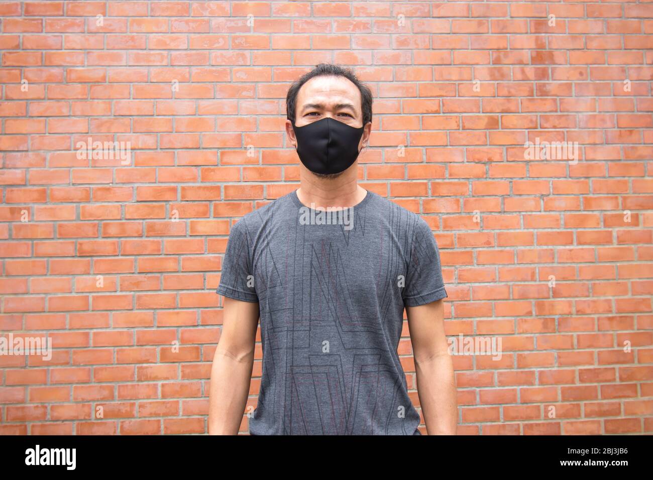 Man wearing a mask hi-res stock photography and images - Alamy
