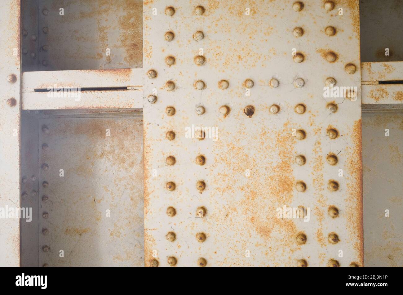 Close up of rivets on steel girders on a British railway bridge in ...
