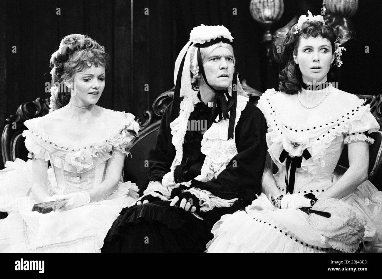 l-r: Celia Bannerman (Amy Spettigue), Tom Courtenay (Lord Fancourt Babberley), Emily Richard (Ela Delahay in CHARLEY'S AUNT by Brandon Thomas at the  Apollo Theatre, London in 1971  set design: Roger Andrews costumes: Malcolm Pride lighting: Robert Bryan director: Braham Murray Stock Photo