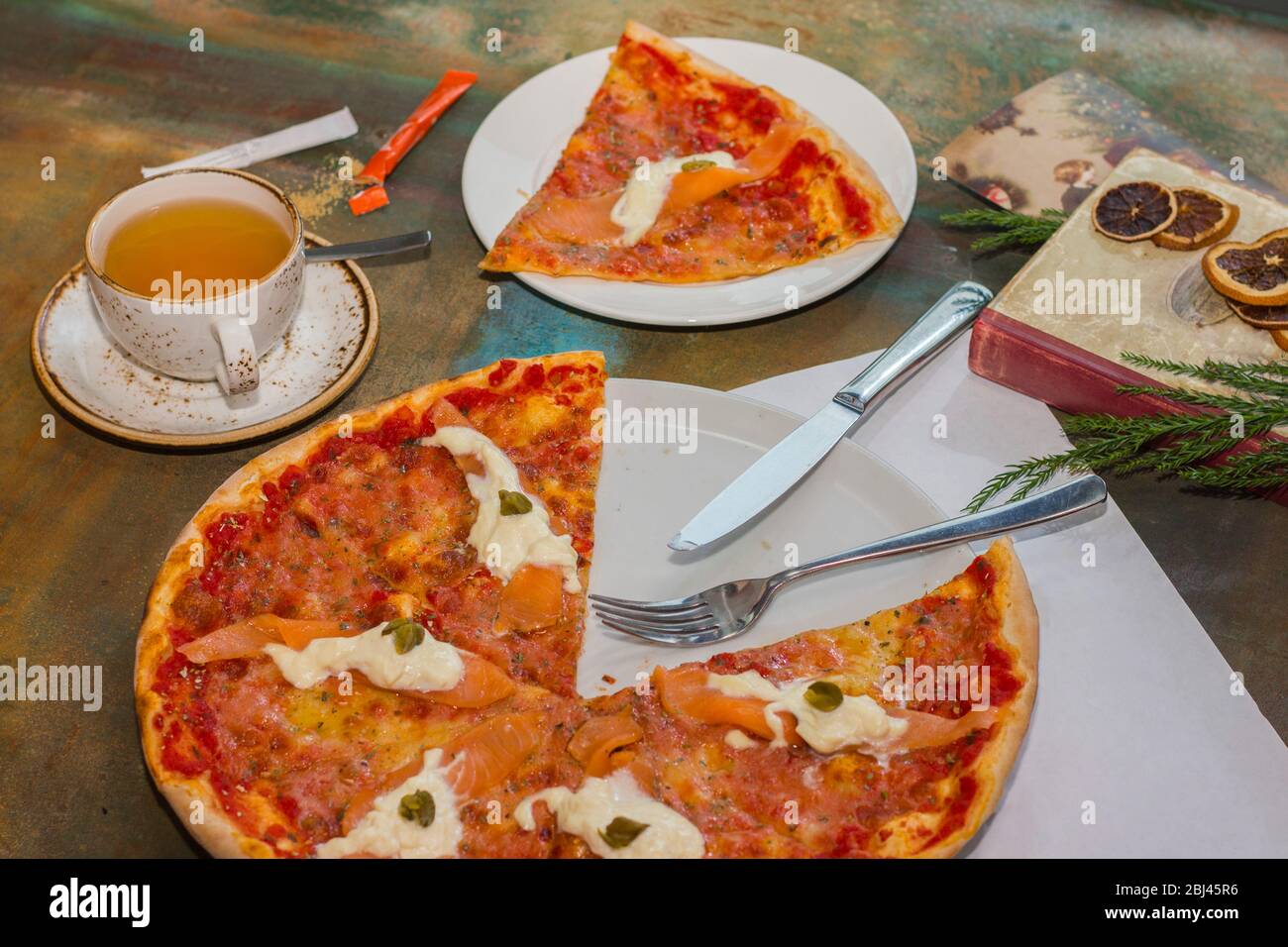 Pizza with red fish and cheese. Seafood Stock Photo