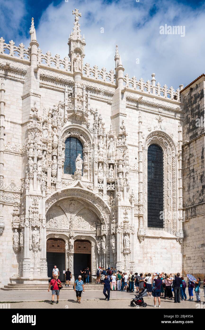 Tourists queue at Church of Santa Maria, Monastery of Jeronimos - Mosteiro  dos Jeronimos in Lisbon, Portugal Stock Photo
