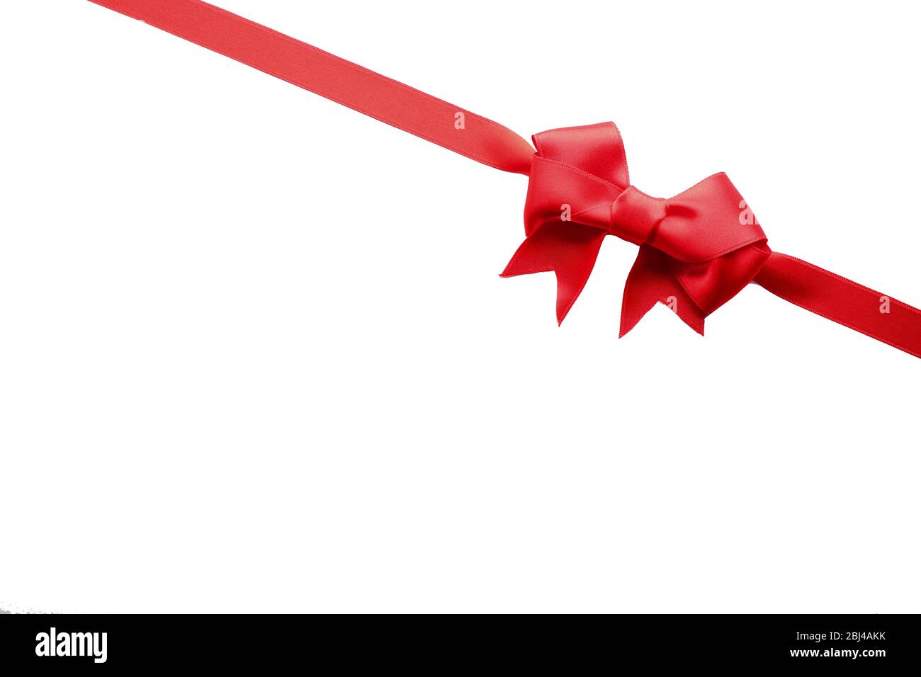 Diagonal ribbon with bow, isolated on white Stock Photo - Alamy