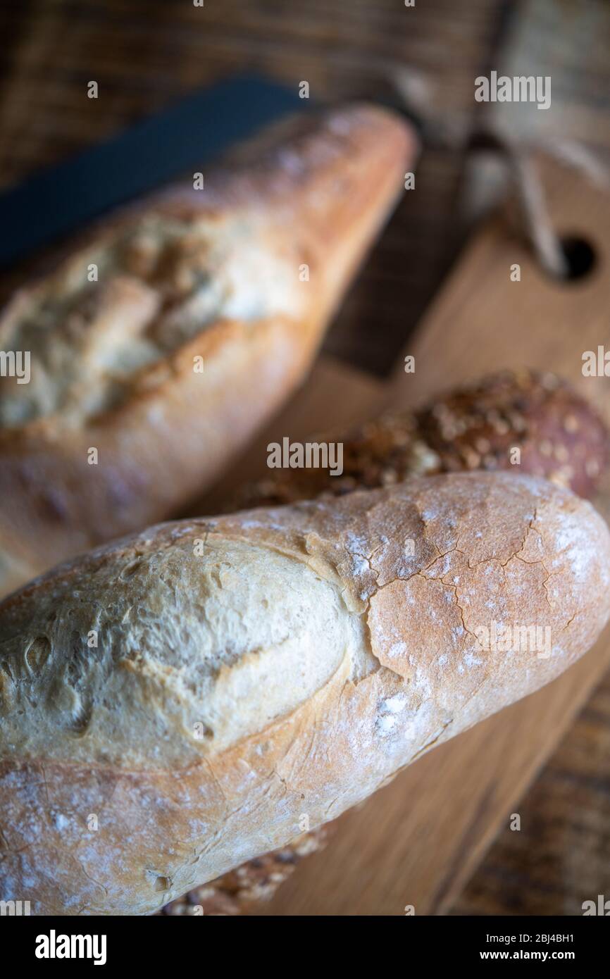 Selection of freshly baked baguettes Stock Photo