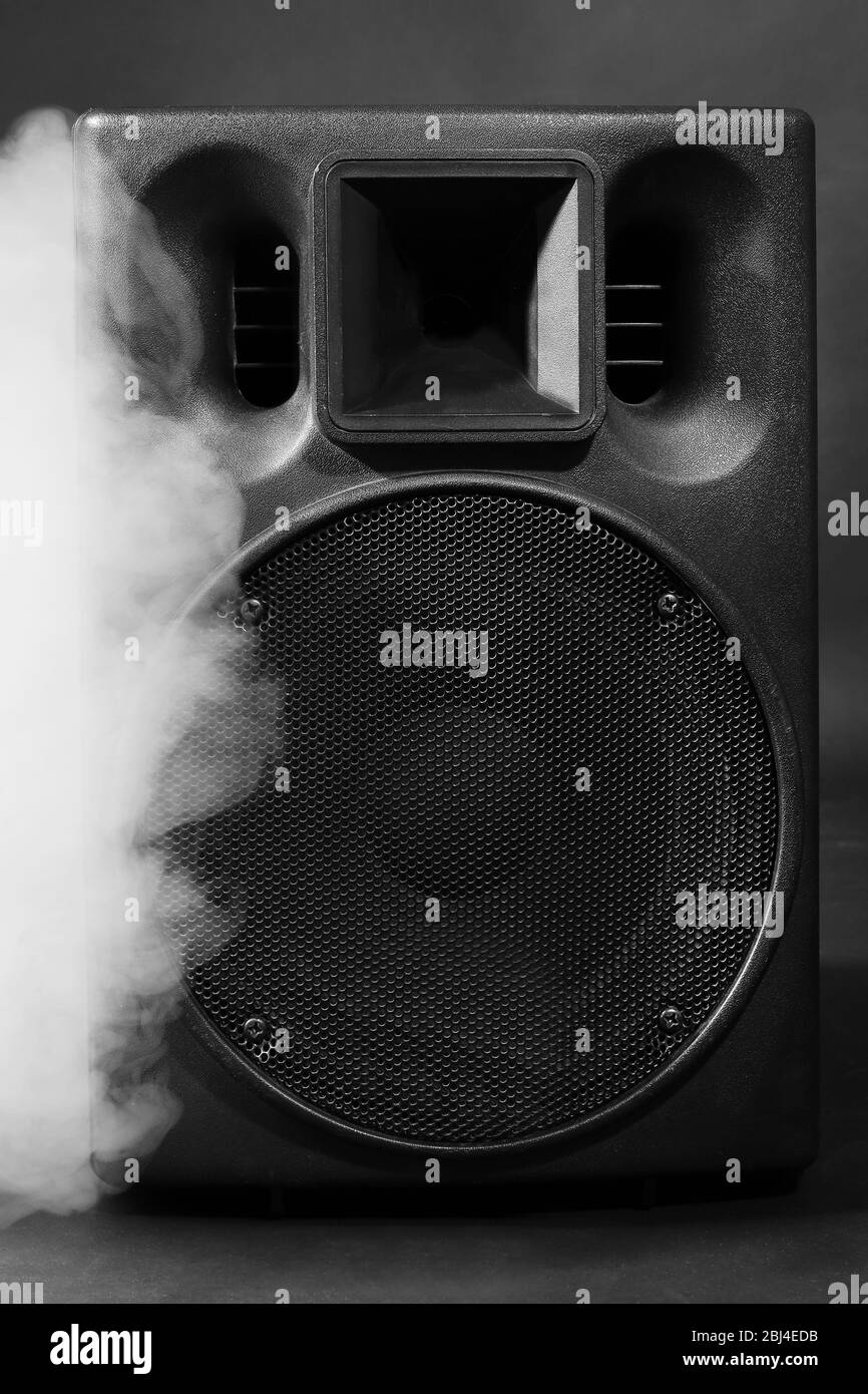 Big loudspeaker in a smoke on black background Stock Photo Alamy