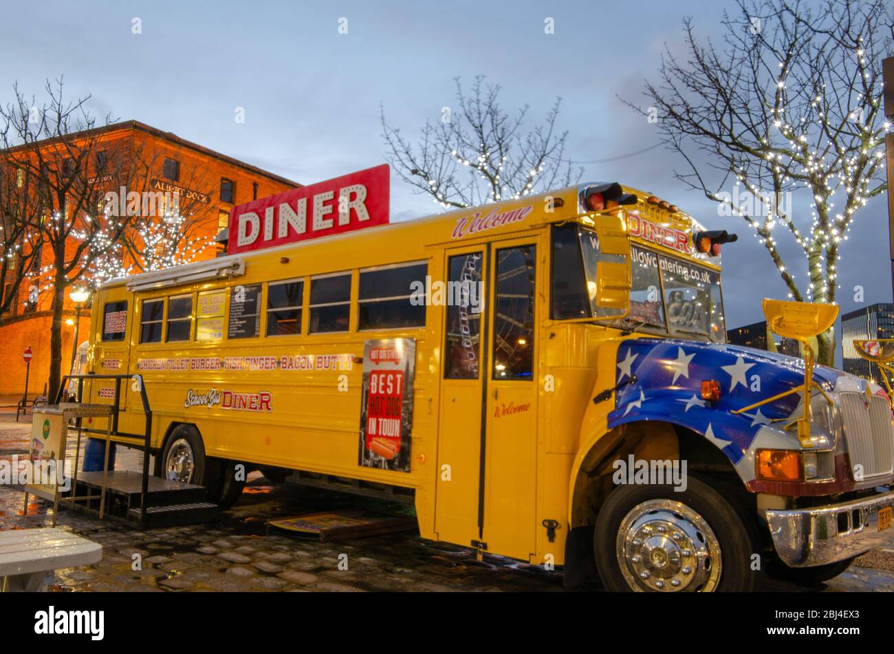 Liverpool, UK Mar 16, 2019 An American style yellow school bus is used as a diner restaurant