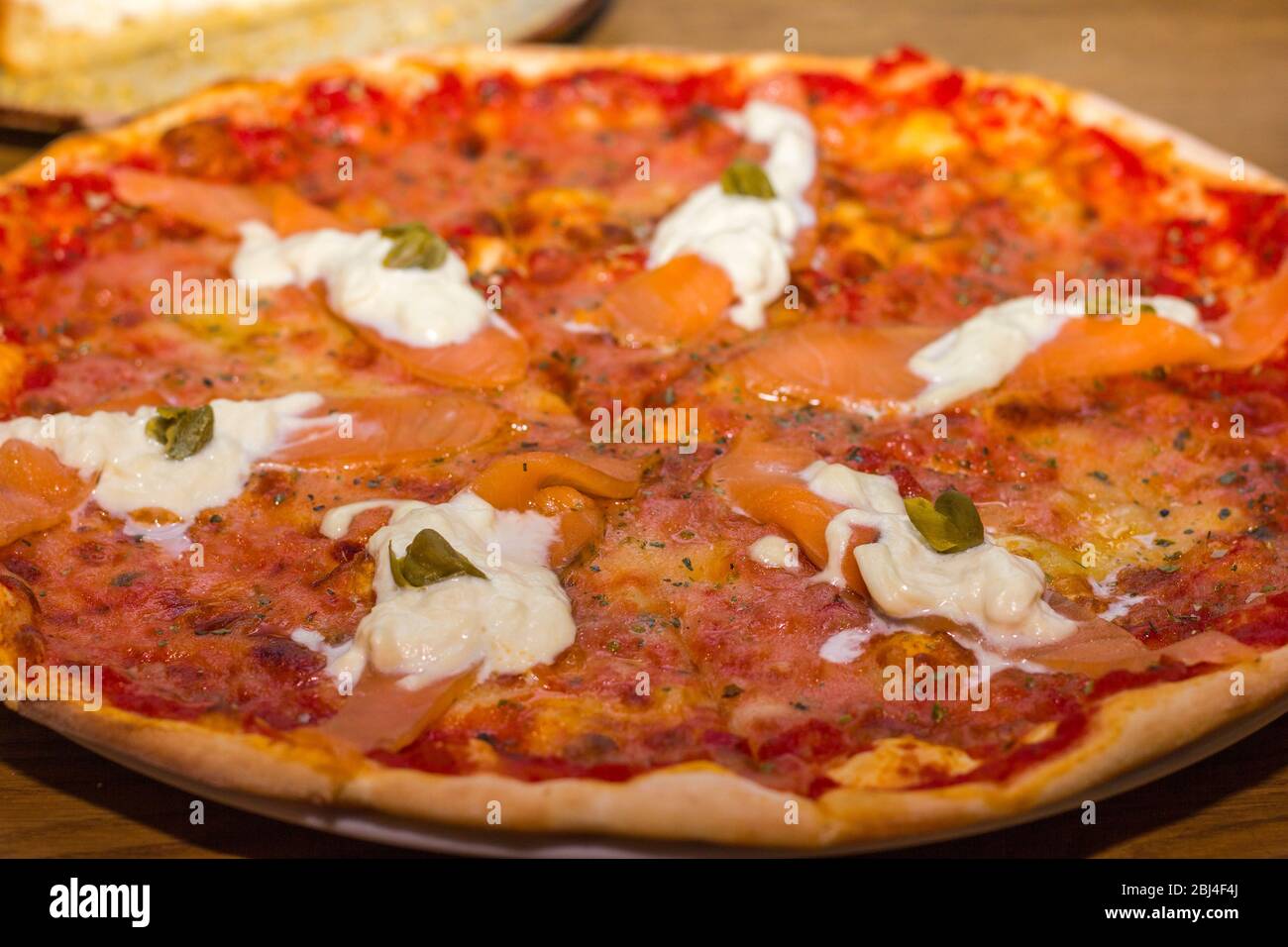 Pizza with fish and cheese close-up Stock Photo
