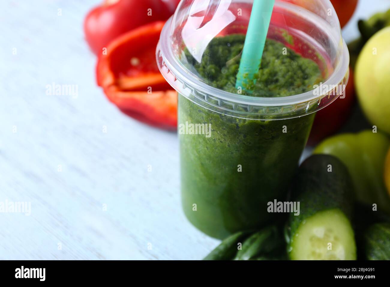 Fresh vegetable juice on wooden background Stock Photo Alamy