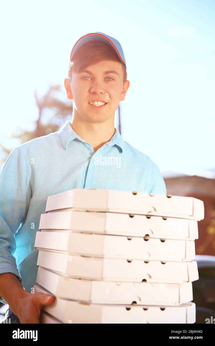 Funny pizza delivery boy hires stock photography and images Alamy