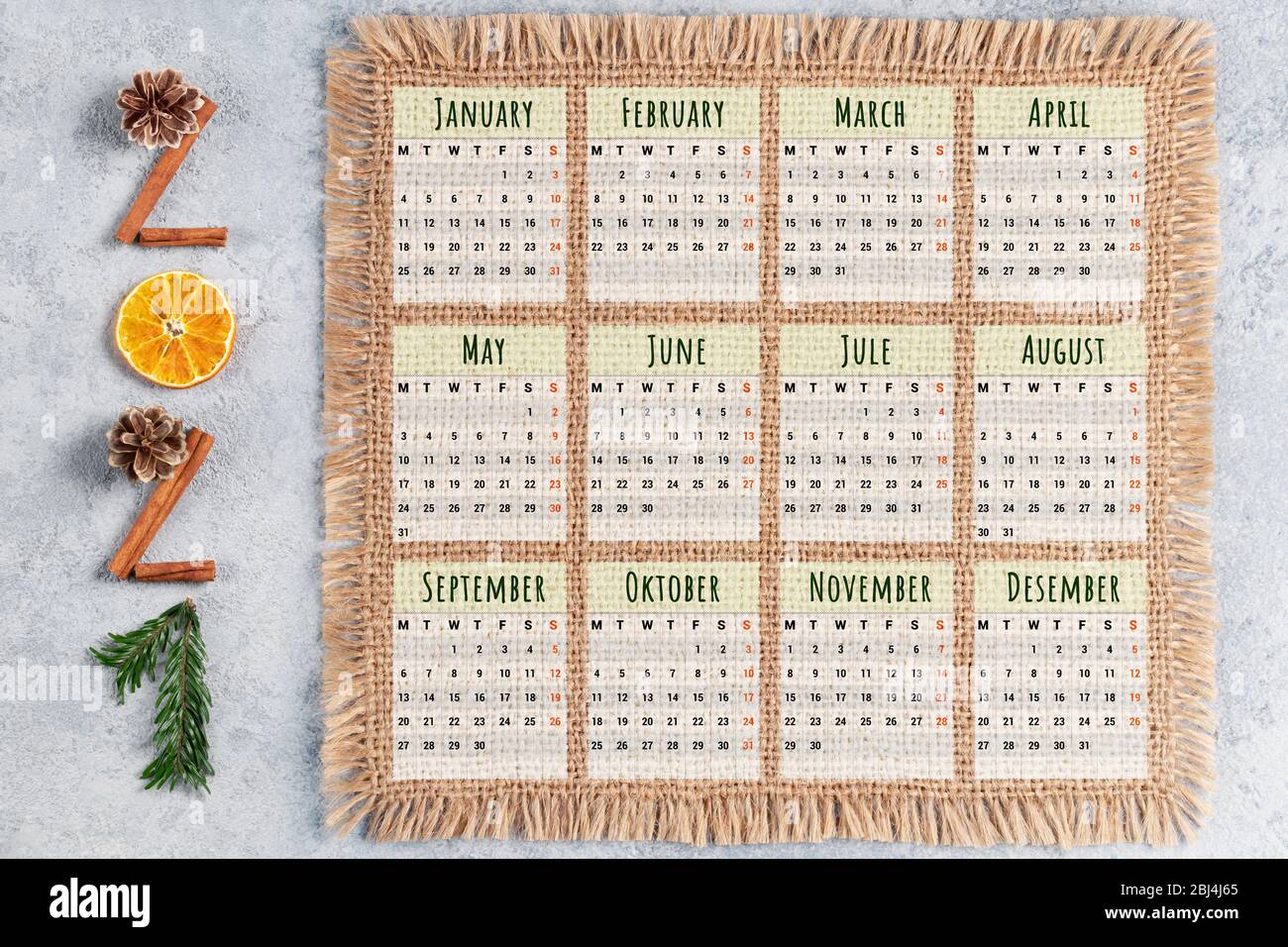 Eco friendly and zero waste pocket or advertising calendar for 2021. Figures from natural materials, the week starts on Monday. Stock Photo