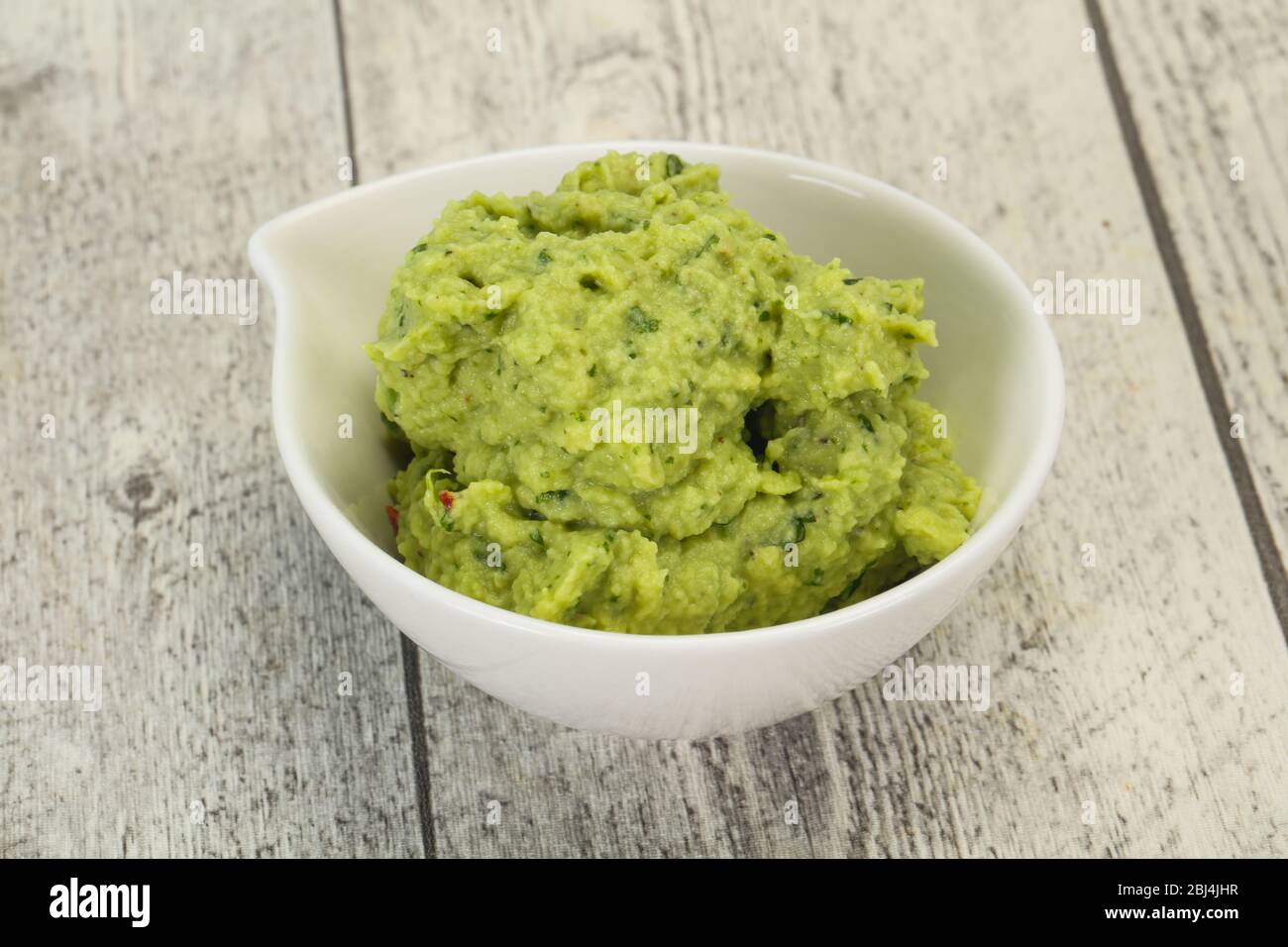 Spicy Avocado guacamole sauce with chili pepper Stock Photo Alamy
