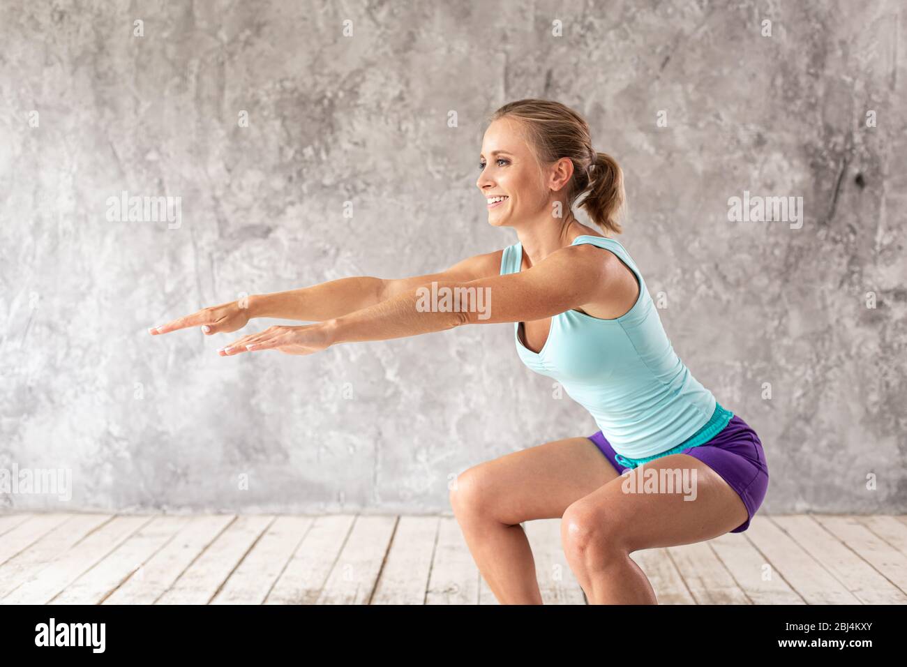 woman-squatting-shorts-hi-res-stock-photography-and-images-alamy