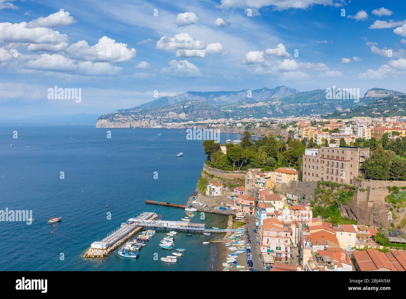 Aerial view of coastline Sorrento and Gulf of Naples - popular tourist destination in Italy. Sunny summer day with blue sky, white clouds, clear sea a Stock Photo