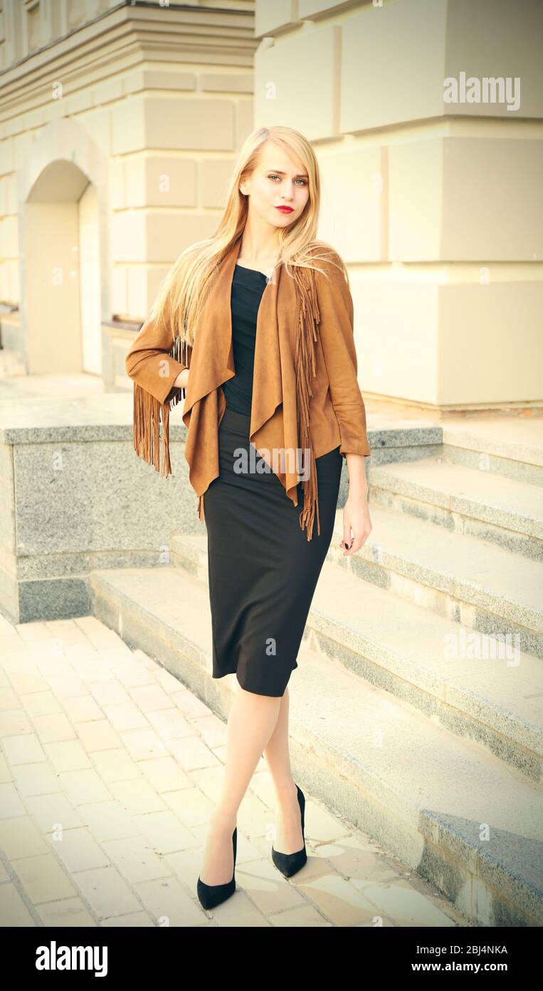 Elegant lady in the street of old city Stock Photo - Alamy