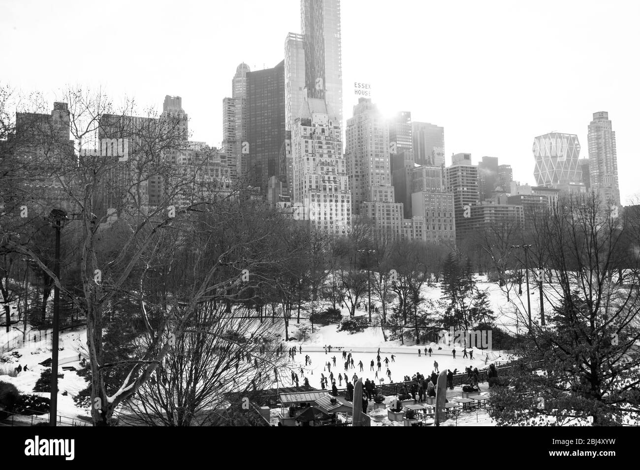 Winter view over the skyscrapers of New York City and the ice rink in Central Park. Stock Photo