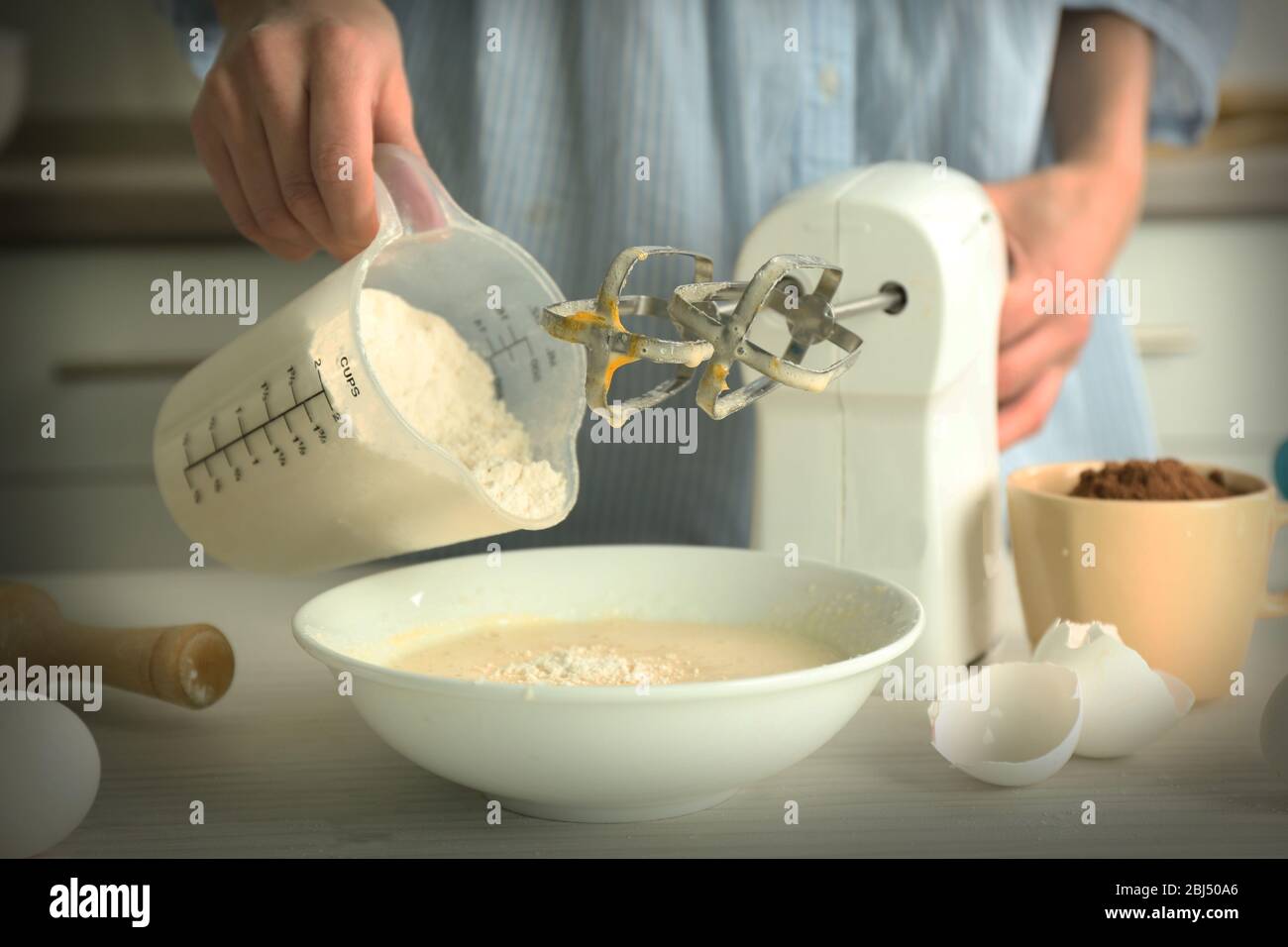 Adding flour mixer bowl hi-res stock photography and images - Alamy