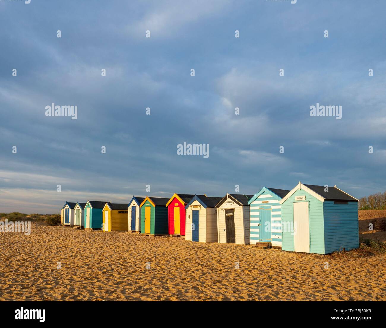 Rows of beach huts on Southwold beach. Stock Photo