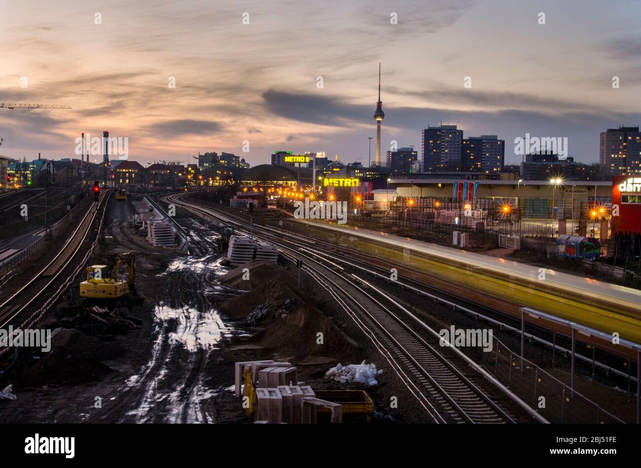 Long exposure of a train pulling into Warschauer Strasse Station in Berlin. Stock Photo