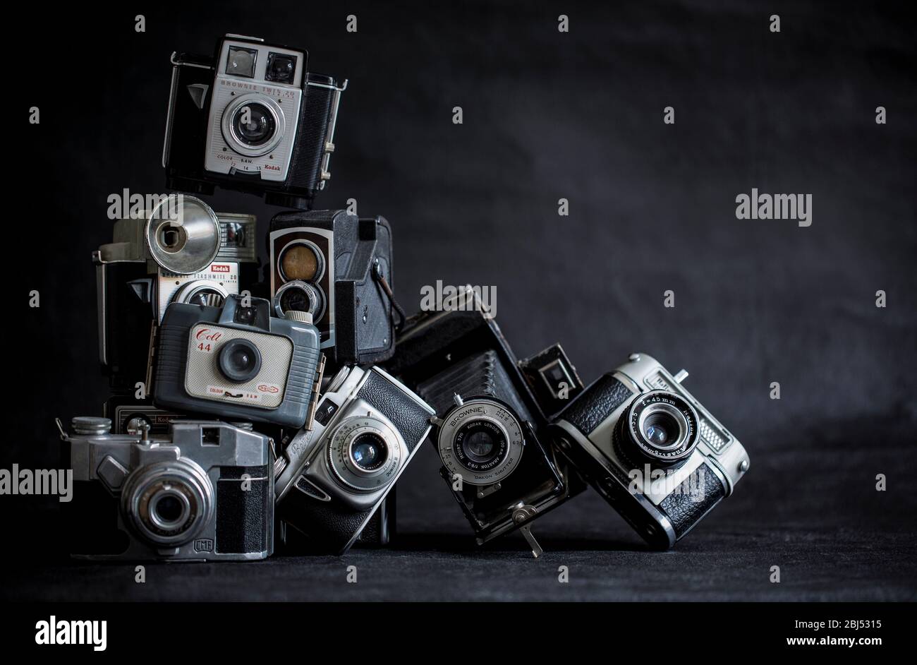 Still life of stacked vintage cameras Stock Photo Alamy
