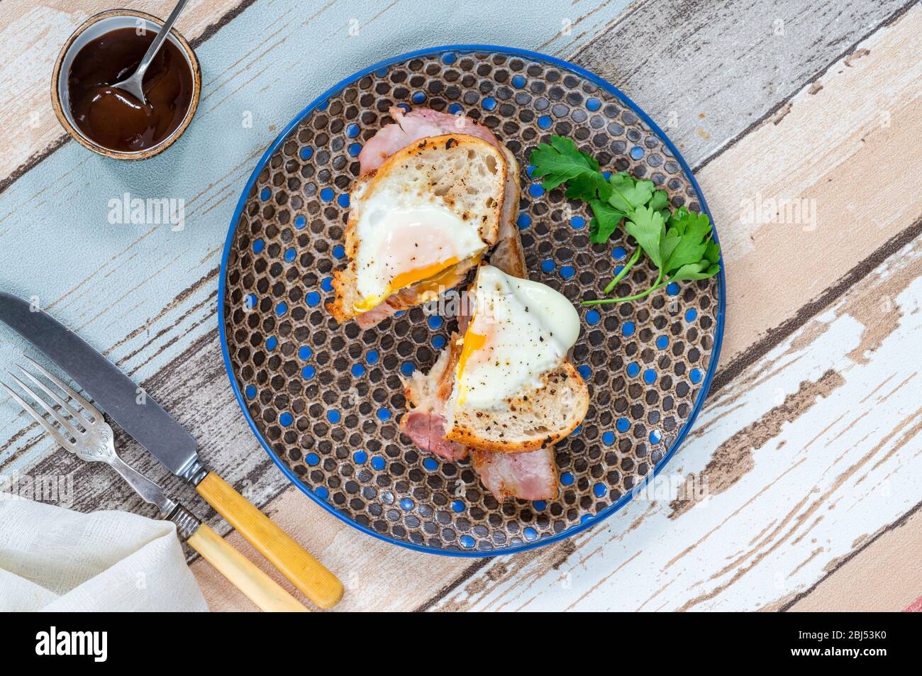 Egginthehole bacon sandwich cut in half overhead view Stock Photo Alamy