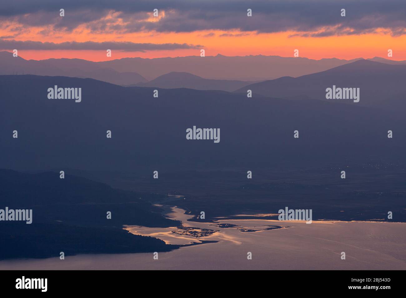 Landscape view of Albanian coastline before sunrise as seen from the summit of Mount Pantokrator, Corfu, Greece Stock Photo