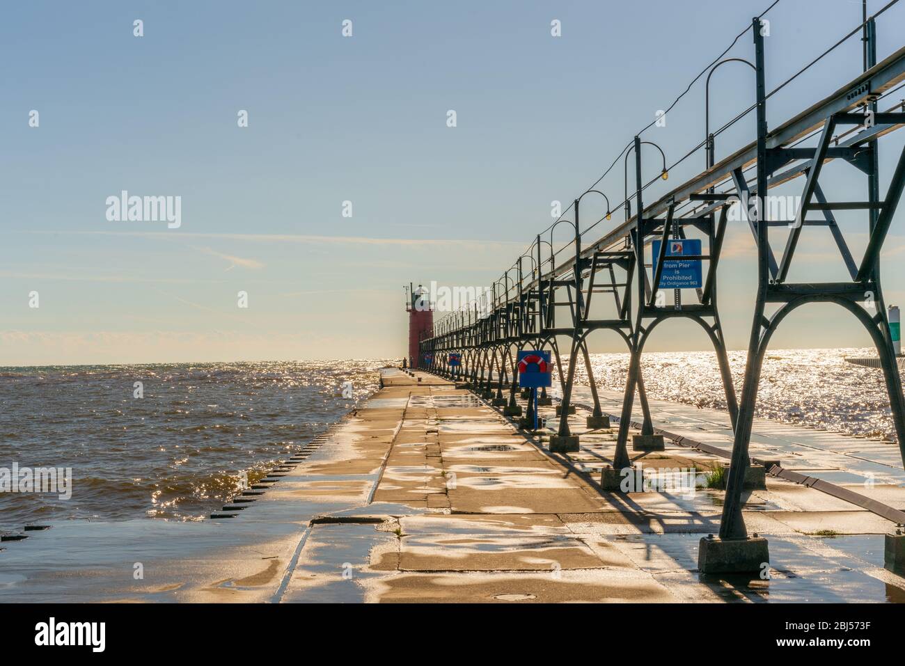South Haven Light on the lake at the end of a concrete pier in South Haven, Michigan. Stock Photo